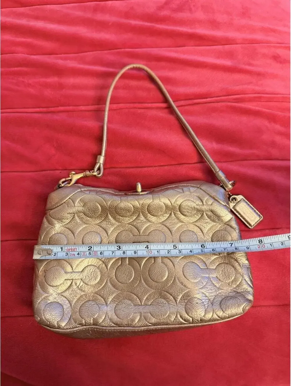 Vintage Rose Gold Coach Turnlock Wristlet
